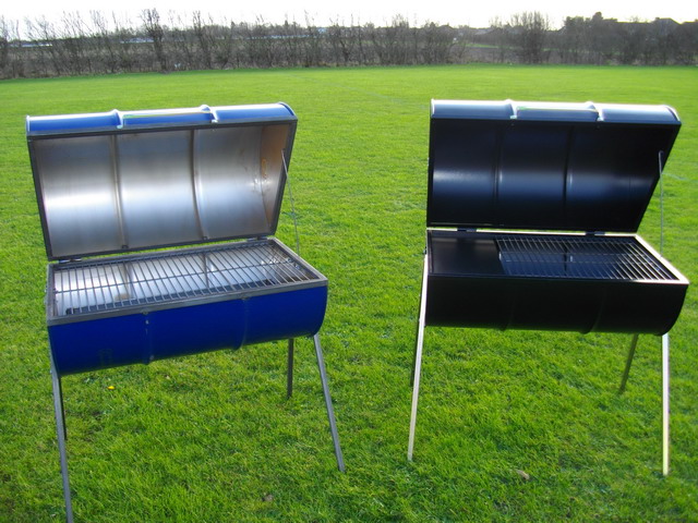 new barrel barbecues one black deluxe barrel barbecue and one blue original barrel barbecue